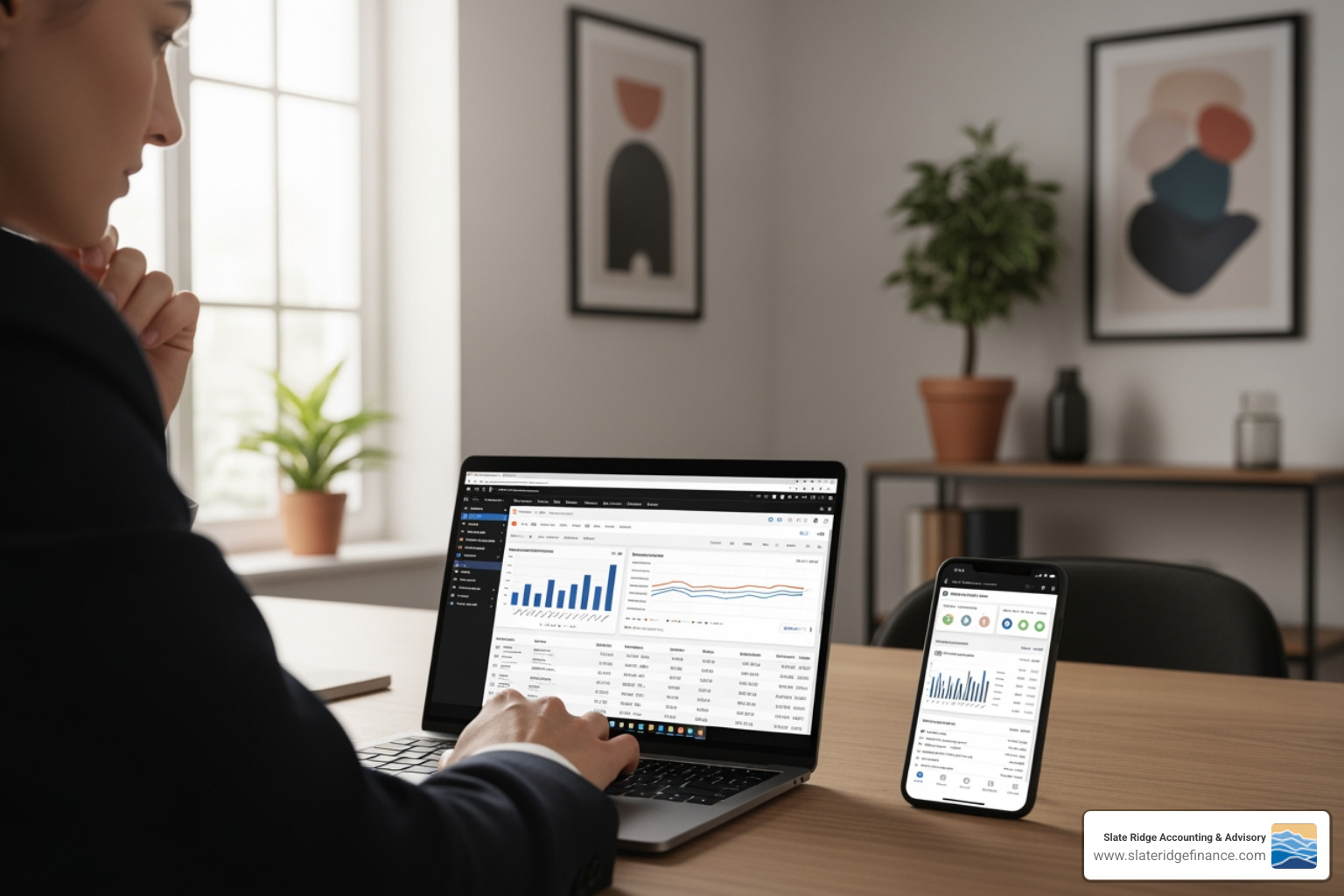 person using accounting software on a laptop and phone - accounting best practices for small businesses
